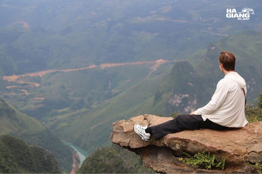 The vertical cliff walls of Tu San Canyon, Ha Giang Loop